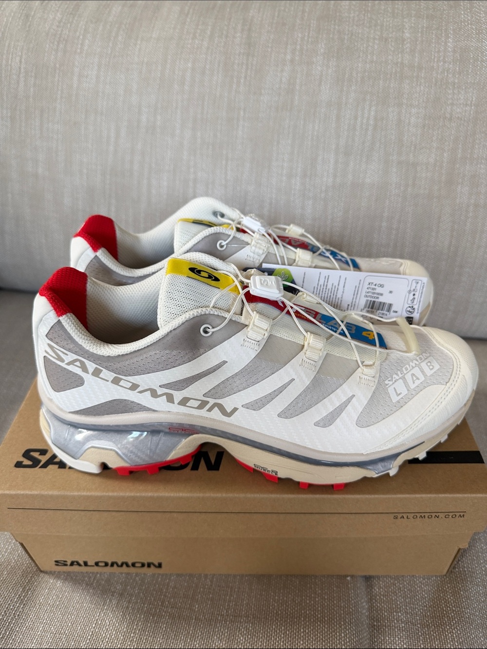 Salomon XT-4 OG Trail Sneakers in vanilla ice/fiery red/white Accents Sz10
